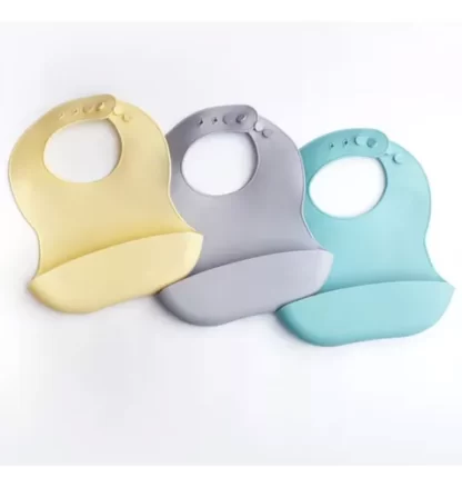 Imagen 3 de 3 de Babero Bebe Silicona Textura Suave Con Bolsillo Impermeable